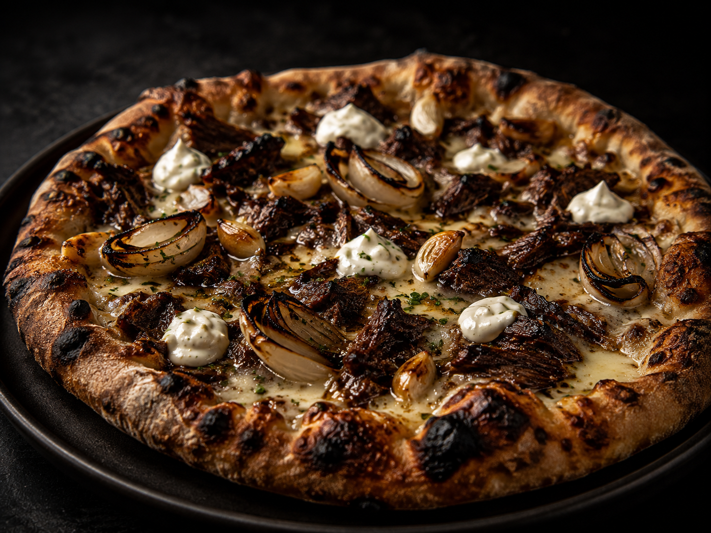 Wood-fired pizza with roasted onion and whipped ricotta